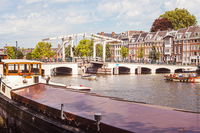 Amsterdam’s Magere Brug, Amsterdam canal bridge, Stefanie Pietschmann Photographer, Skinny Bridge Amsterdam, Pietschy Photography, historical bridges Netherlands, Magere Brug night photography, iconic Amsterdam landmarks, sustainable wall art, storytellin