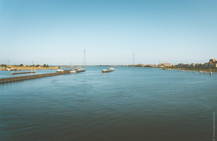 IJmeer Netherlands, IJmeer Amsterdam waterfront, IJmeer lake view, Dutch waterscape photography, boats on IJmeer, Amsterdam IJmeer panorama, Netherlands water landscape, serene waterfront Netherlands, IJmeer fine art print, Dutch coastal photography