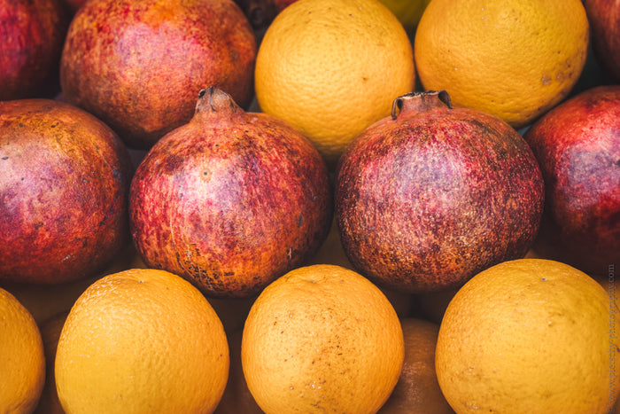 juice bar Tel Aviv, fresh fruit market Tel Aviv, pomegranate and oranges photography, colorful fruit wall art, Mediterranean food photography, Tel Aviv market print, healthy lifestyle Tel Aviv, vibrant kitchen wall art, Israeli market photography, fruit s