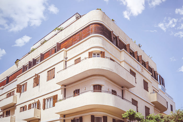 Bauhaus in Tel Aviv’s Shenkin Street, modernist architecture Israel, Stefanie Pietschmann Photographer, curved Bauhaus facade, Pietschy Photography, White City heritage, Tel Aviv architectural details, minimalist urban design, sustainable wall art, storyt