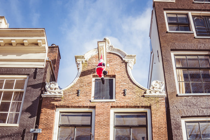 Christmas in Amsterdam, Amsterdam Christmas photography, Amsterdam houses at Christmas, festive Amsterdam buildings, winter in Amsterdam Netherlands, Santa Claus Amsterdam, Sinterklaas Amsterdam, Dutch Christmas cityscape, Amsterdam holiday wall art, Amst