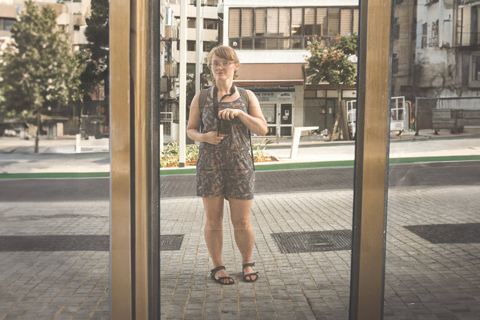 self-portrait in photography, photographer self portrait, documentary photographer, reflection photography, self portrait photography, female photographer portrait, urban photography portrait, artist self portrait, creative self portrait, street photograp