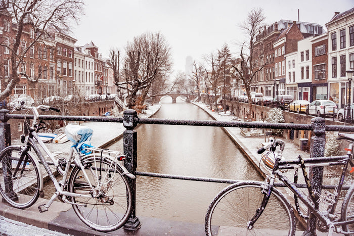 Oudegracht Utrecht winter, Utrecht canals in snow, winter in Utrecht Netherlands, Oudegracht canal view, snowy Utrecht cityscape, Utrecht winter photography, Dutch canals winter scene, bicycles in snow Utrecht, historic Utrecht Netherlands, cozy winter ci