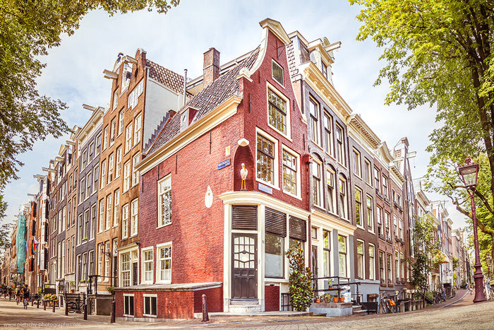 Amsterdam’s Prinsengracht, canal houses Amsterdam, Stefanie Pietschmann Photographer, historic Dutch architecture, Pietschy Photography, Prinsengracht canal reflections, timeless Amsterdam scenery, heritage cityscape Netherlands, sustainable wall art, sto