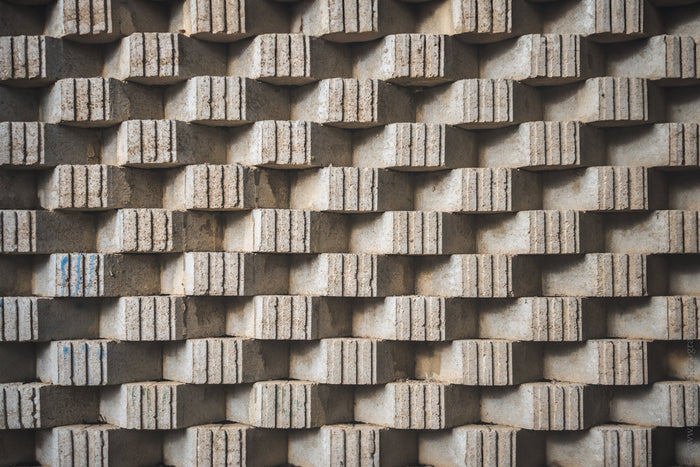 geometric wall design in Givatayim, geometric architecture Israel, architectural pattern photography, concrete wall texture, geometric facade design, abstract architecture photography, repetitive architectural pattern, modern architecture detail, urban ge