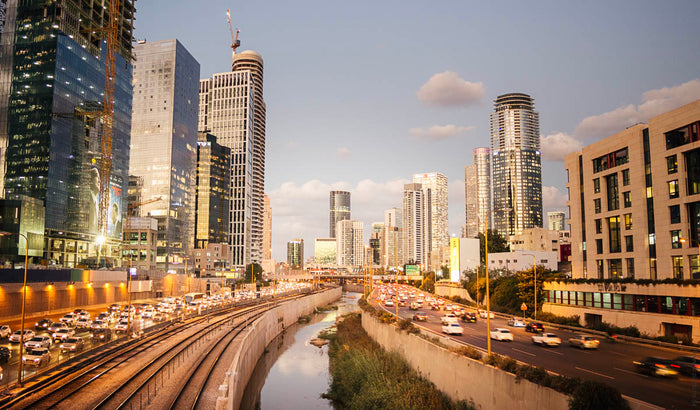rush hour Tel Aviv, Ayalon Highway traffic Tel Aviv, Tel Aviv skyline sunset, urban life Tel Aviv, cityscape Israel photography, Tel Aviv business district, modern architecture Tel Aviv, evening commute Israel, dynamic city photography, Tel Aviv metropoli