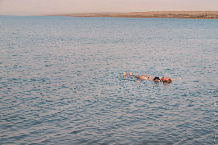 floating in the Dead Sea, Dead Sea floating, Dead Sea Israel, Dead Sea photography, Dead Sea landscape, Dead Sea travel photography, floating in Dead Sea Israel, Dead Sea water, Dead Sea experience, Israel photography, Israel travel photography, Dead Sea 