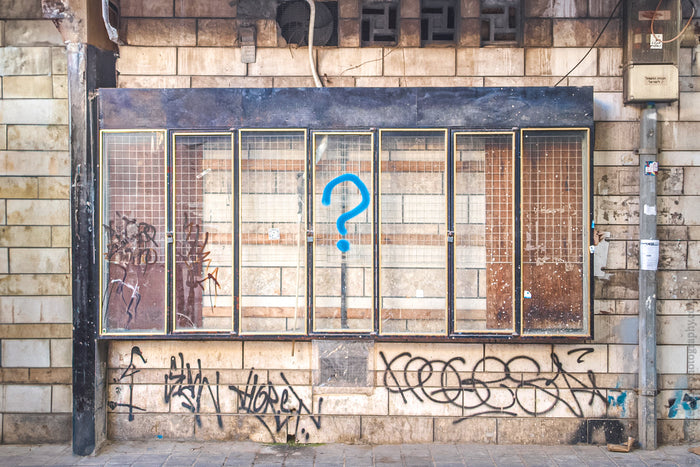 street art in Tel Aviv, Tel Aviv street art, urban art Tel Aviv, Tel Aviv graffiti, hidden corners of Tel Aviv, urban photography Israel, Tel Aviv city details, abandoned storefront Tel Aviv, question mark graffiti, alternative Tel Aviv, Tel Aviv fine art