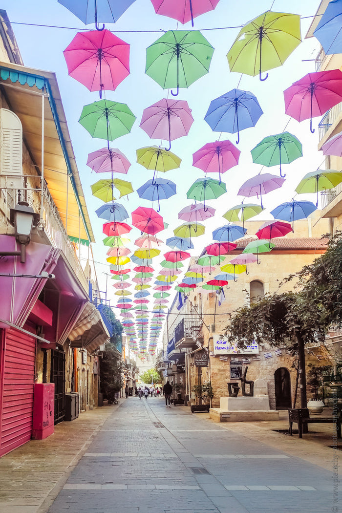 Jerusalem Umbrella Street, Iconic Street Art in Jerusalem, Travel Photography Jerusalem, The Space Between Reflection, Colorful Umbrellas Jerusalem, photographer Stefanie Pietschmann,