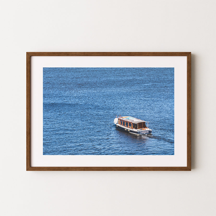 Amsterdam wall art, boat on IJ river, IJ river Amsterdam print, Amsterdam canal boat photo, Netherlands travel photography, Dutch waterway art, fine art Amsterdam poster, minimalist boat print, cinematic water photography, museum-quality wall decor, Amsterdam fine art print