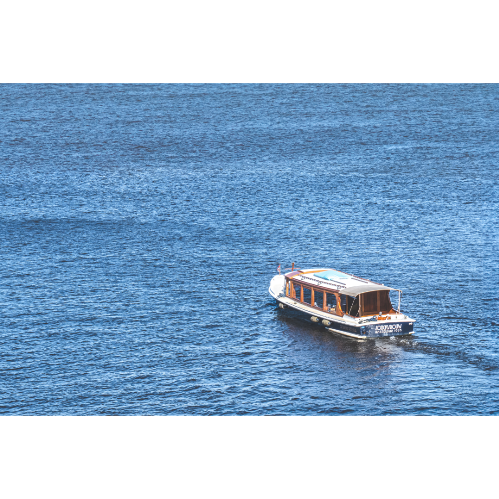 Amsterdam wall art, boat on IJ river, IJ river Amsterdam print, Amsterdam canal boat photo, Netherlands travel photography, Dutch waterway art, fine art Amsterdam poster, minimalist boat print, cinematic water photography, museum-quality wall decor, Amsterdam fine art print