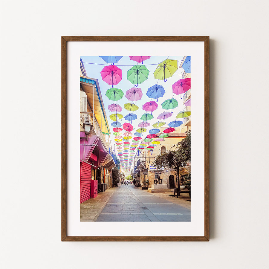 Jerusalem wall art, colorful umbrella street art, Israel photography print, vibrant street scene, Middle East wall decor, fine art Jerusalem print, modern Judaica wall art, architecture photography, travel-inspired artwork, Jerusalem photo print, umbrella photography, bold cityscape wall art, Jerusalem street print, Israel fine art print