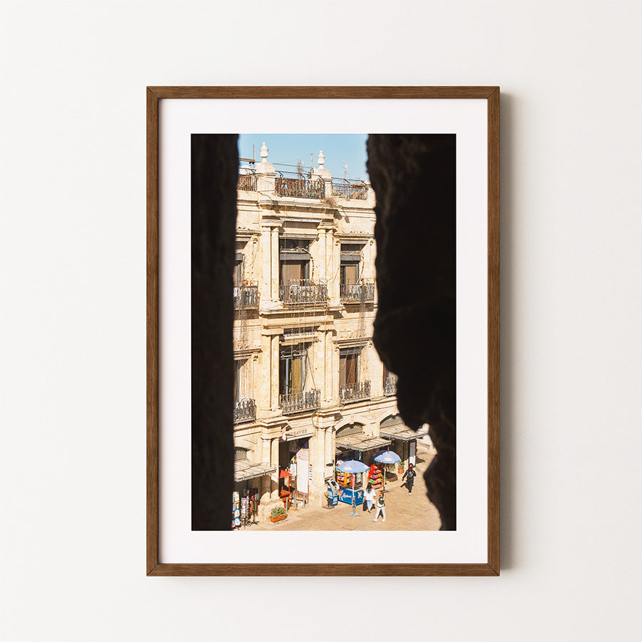 This Jerusalem wall art invites you into the timeless calm of the Old City, where golden stone meets shadow and light. Framed by the Tower of David, this view reveals a sunlit corner of Jerusalem, where daily rhythm meets historic architecture.
