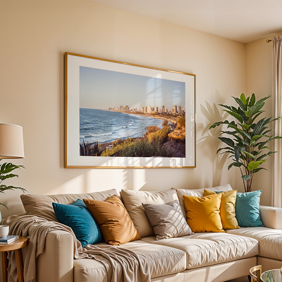 This Tel Aviv beach wall art captures the peaceful yet vibrant Mediterranean coastline where city meets sea, bathed in warm golden light. A fine art print that brings calm and inspiration into any space.
