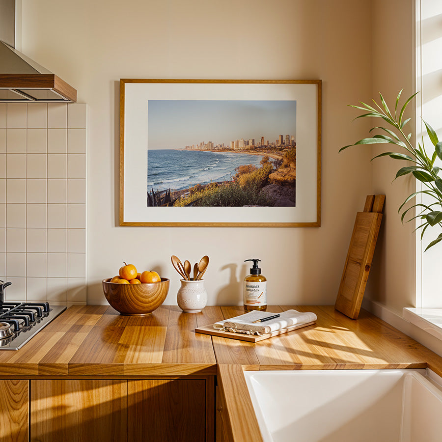 This Tel Aviv beach wall art captures the peaceful yet vibrant Mediterranean coastline where city meets sea, bathed in warm golden light. A fine art print that brings calm and inspiration into any space.
